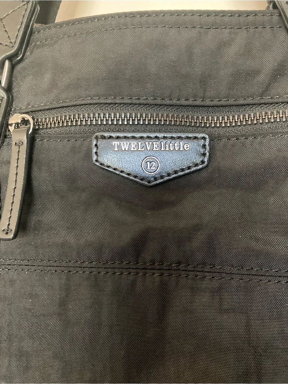 Twelvelittle sleek black